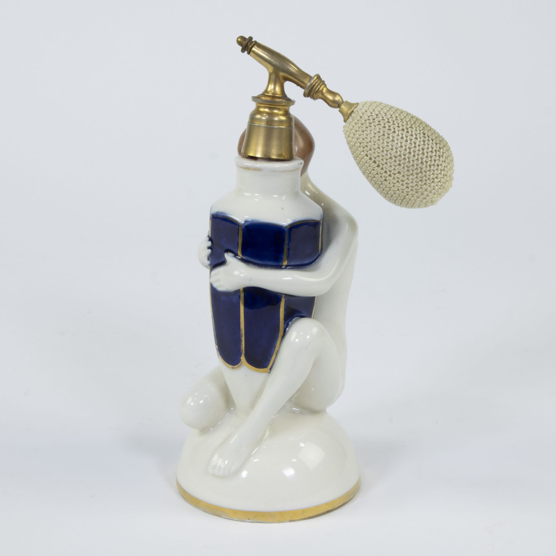 A Royal Dux art deco fine porcelain perfume bottle depicting a nude woman holding a faceted vase dec - Image 2 of 5