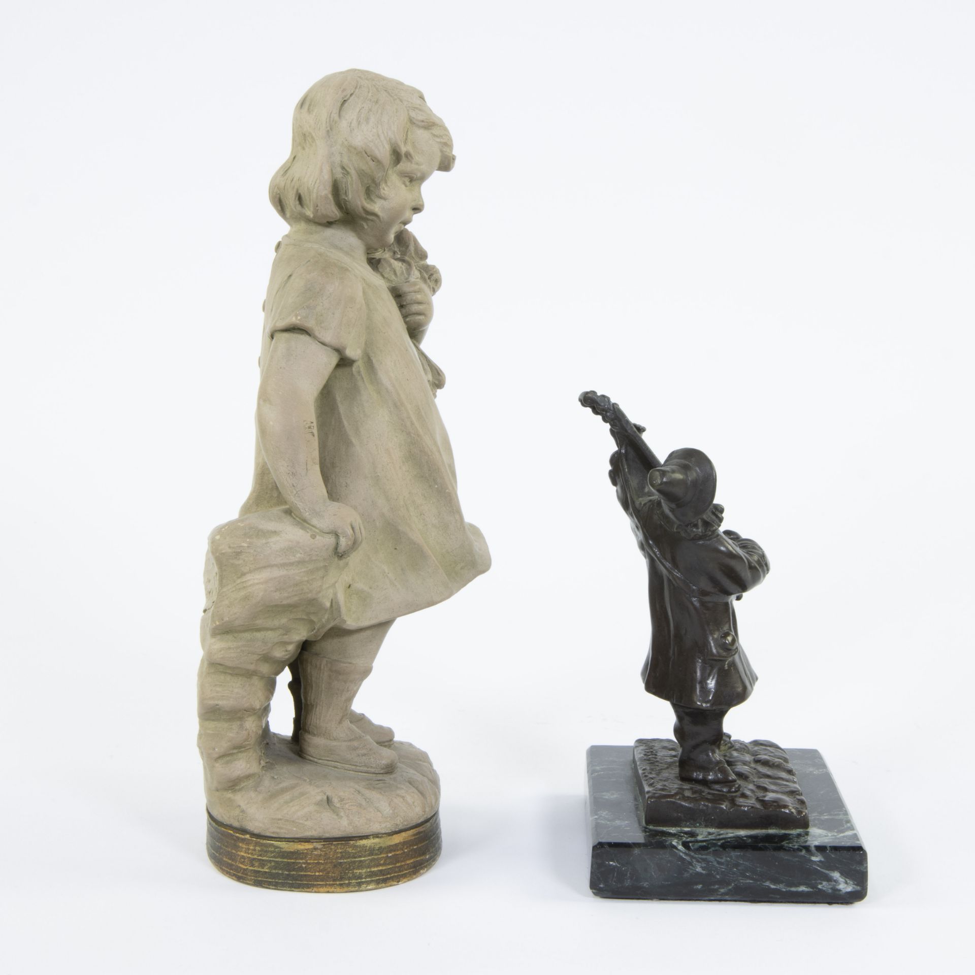 Collection of a bronze in black patina The musician, signed Rousseau and a terracotta figurine Flowe - Image 4 of 6