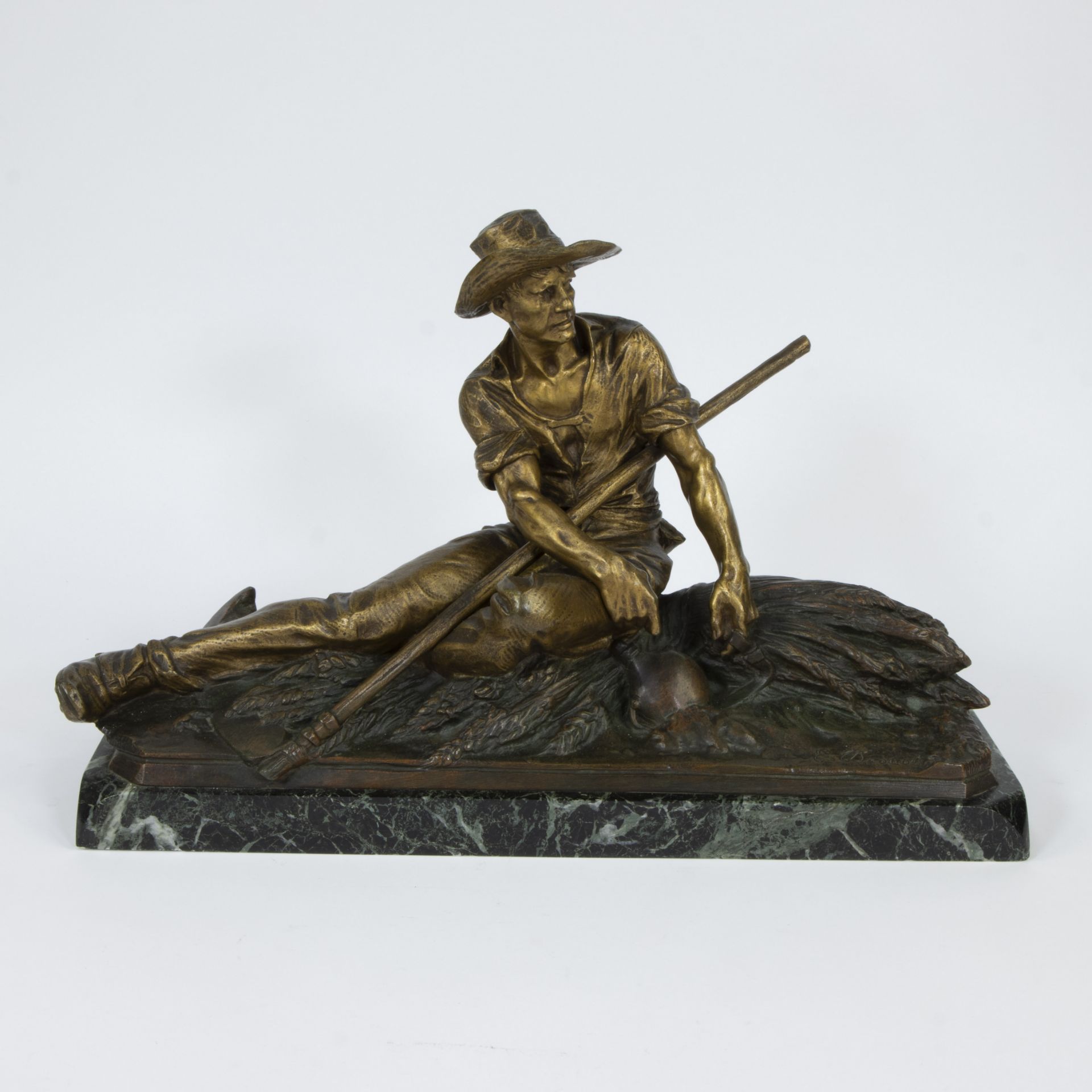 Edouard DROUOT (1859-1945), gold patinated bronze sculpture of a resting peasant on marble plinth, s