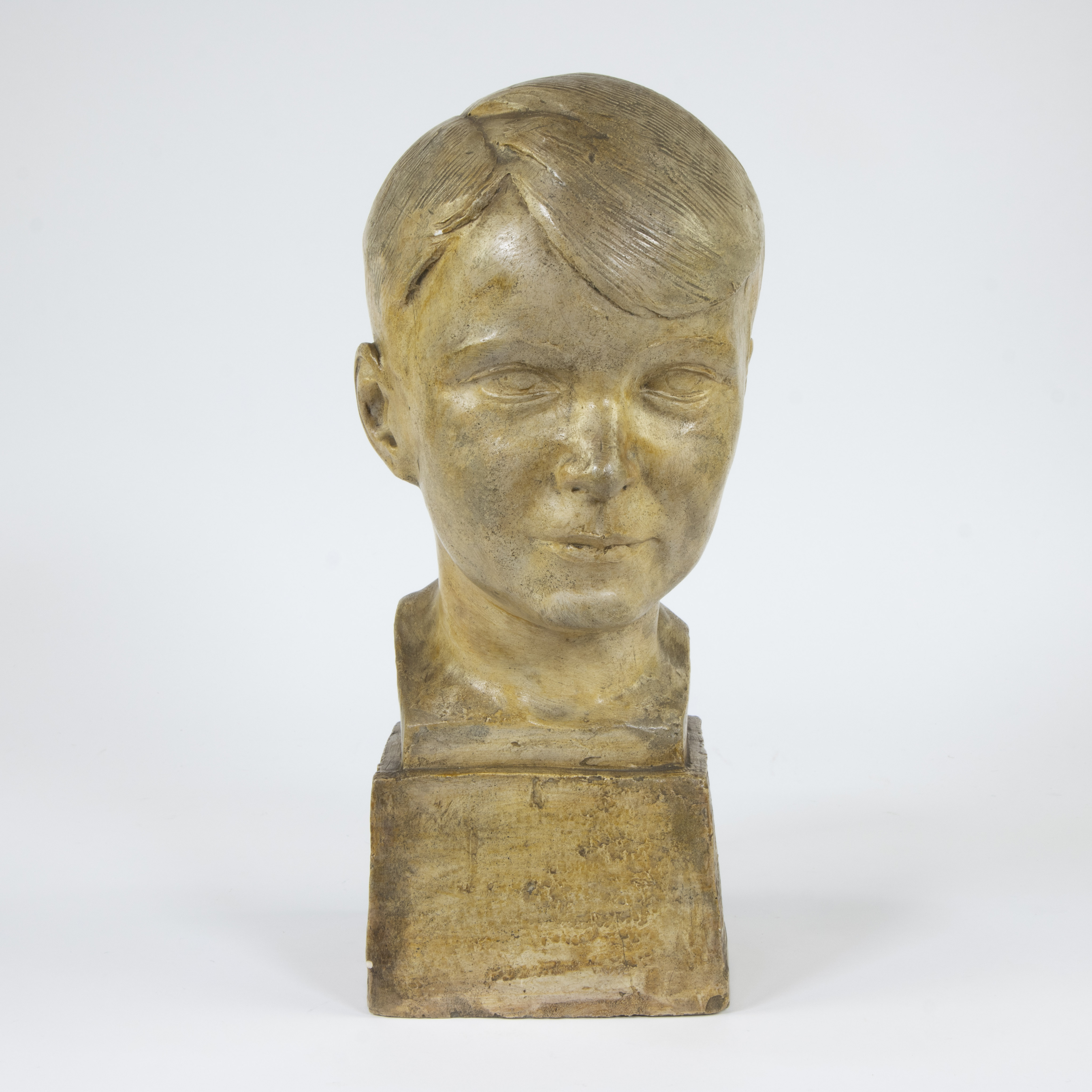 Olivier PIETTE (1885-1948), patinated plaster sculpture of a boy's head, signed