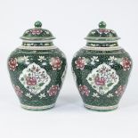 Pair of lidded vases in Samson porcelain with floral decoration in famille rose style