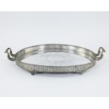 Large silver serving dish with central hand-engraved motif and finely perforated rim in the shape of
