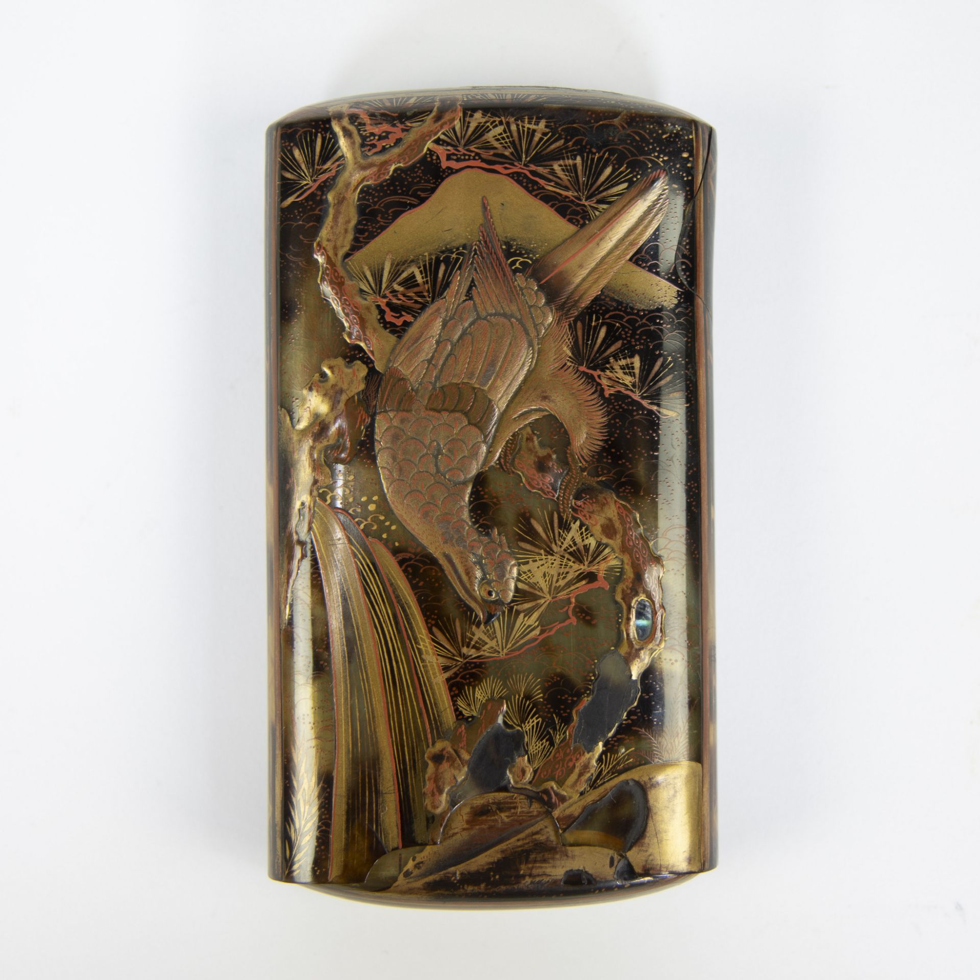 A Japanese Meiji period lacquered tortoiseshell cigar case decorated with cranes and birds in a land