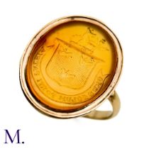 An Antique Agate Seal Ring. The antique gold ring is set with a carved agate intaglio (approxiamtely