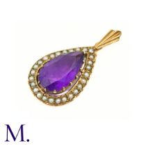 An Antique Amethyst and Pearl Pendant in 9ct yellow gold, the central pear shaped amethyst