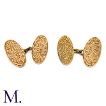 A Pair of Rose Gold Oval Cufflinks in 9k rose gold, the oval form with engraved celtic pattern
