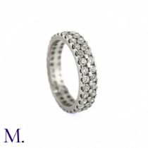 A Double Row Diamond Eternity Ring. The diamond ring is set with approximately 1.25ct of round cut