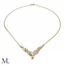 A Diamond Ribbon Collar in 18ct gold, set with approximately 1.0ct of baguette diamonds and 0.40ct