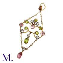 An Antique Gem-Set Pendant in yellow gold, set with peridot, blue spinel and pink tourmaline, and