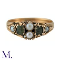 An Antique Emerald And Pearl Ring in 15k yellow gold, set with two step cut emeralds and accented by