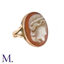 A Carved Carnelian Cameo Ring in 9k yellow gold, the carnelian cameo depicting a woman in profile.