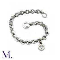 Chopard Diamond Heart Charm Bracelet in 18K white gold. Marked for Chopard, 18ct white gold with