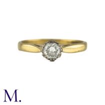 A Diamond Solitaire Ring in 18k yellow gold, set with a round cut diamond of 0.25cts. Hallmarked for