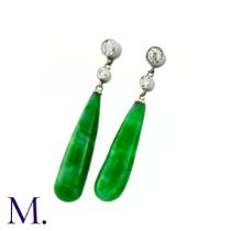 A Pair of Jade Drop Earrings in platinum, two round brilliant cut diamonds suspending the polished
