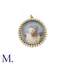 An Antique Portrait Miniature Pendant in yellow gold, set with a miniature depicting a woman, in a