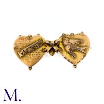 An Antique Mizpah Brooch in 9k gold, designed as two hearts embossed with the word 'mizpah' and
