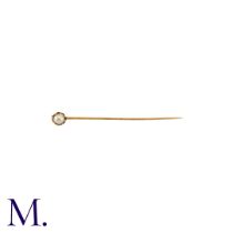NO RESERVE - A Stick Pin in yellow gold, the terminal a claw set pearl. (Unmarked but tests indicate
