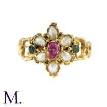An Antique Ruby, Pearl And Emerald Ring in yellow gold, set with a central pear shape ruby,