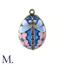 An Enamelled Egg Pendant with blue, pink and white enamel, no markings visible. Size: 2.7cm