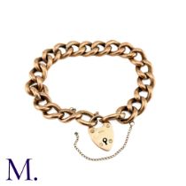 An Antique Curb Bracelet in 9k rose gold, comprising a series of polished curb links, suspending a