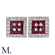 A Pair Of Ruby And Diamond Earrings