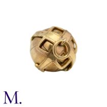 A Masonic Orb Pendant in 9k yellow gold and silver, the hinged spherical body opens to display a