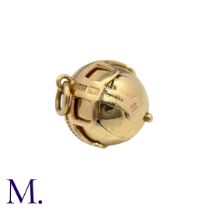 A Masonic Orb Pendant in 9k yellow gold, the hinged spherical body opens to display a cross formed