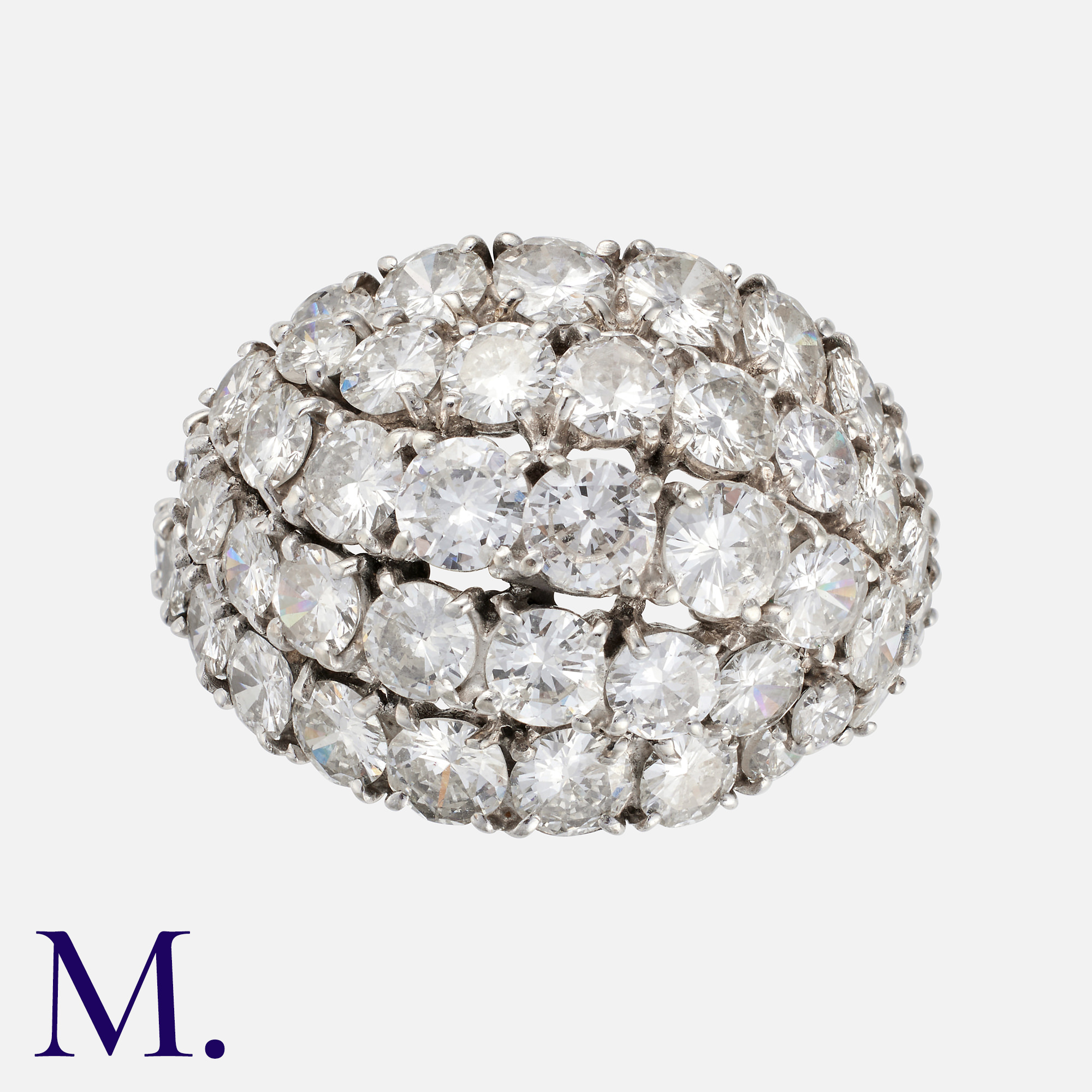 CARTIER. A Diamond Bombe Ring in platinum, the bombé form set with round cut diamonds totalling