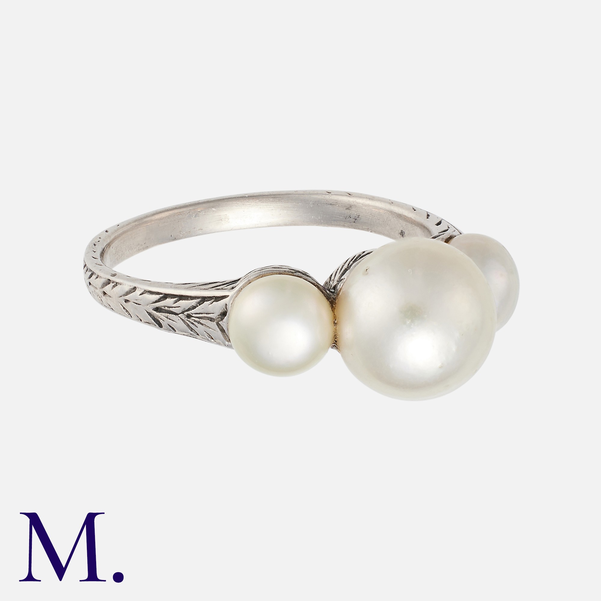 A Natural Pearl Three Stone Ring in platinum set with three pearls to an engraved band. With a - Image 2 of 2