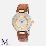 Cartier. A Ladies Must de Cartier 21 two-tone wristwatch, 1340, the circular brushed dial with outer
