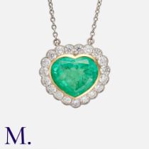 An Emerald & Diamond Heart Shaped Cluster Pendant in 18k yellow gold and platinum, the principal