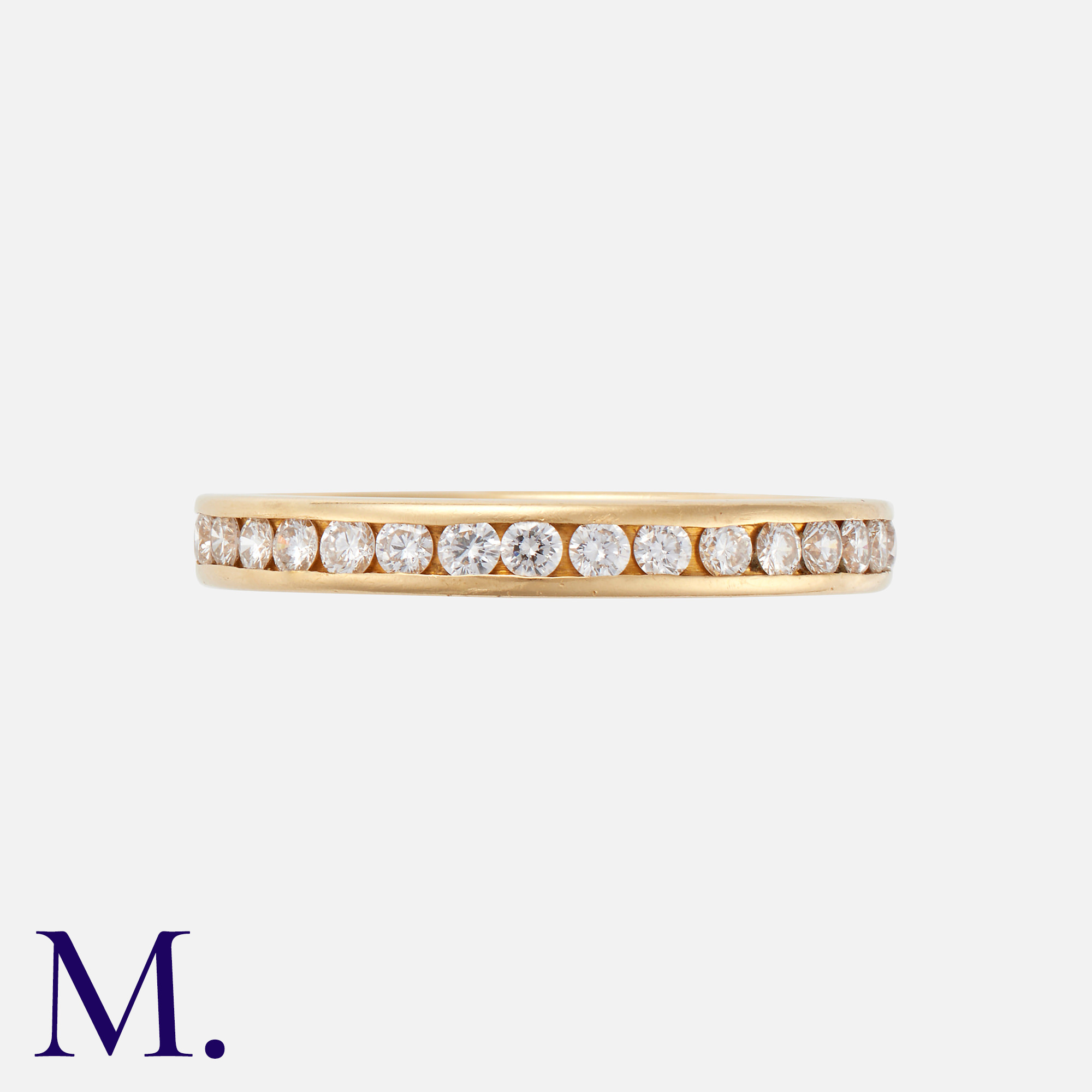 TIFFANY & CO. A Diamond Eternity Ring in 18K yellow gold, set with round brilliant diamonds weighing - Image 2 of 2