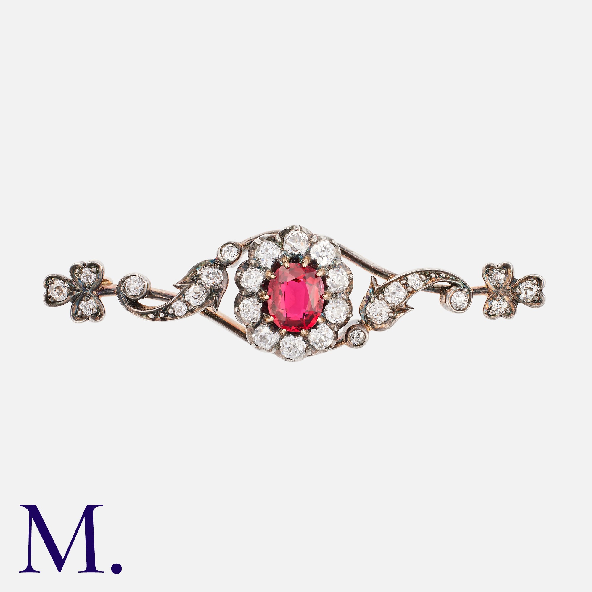 An Antique Spinel & Diamond Bar Brooch in yellow gold and silver, set with a principal oval cut