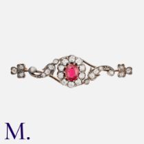 An Antique Spinel & Diamond Bar Brooch in yellow gold and silver, set with a principal oval cut