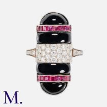 An Onyx, Ruby & Diamond Ring in 18k white gold, set with four pieces of polished onyx, accented by