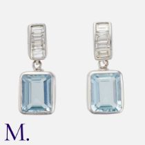A Pair of Aquamarine & Diamond Earrings in 18K white gold, set with emerald cut aquamarines weighing