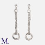 CARTIER. A Pair of Trinity Earrings in 18K white gold, with trinity rings set to entwined chains,