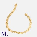 CARTIER. A Gentiane 3-Row Collar in 18K yellow gold, with articulated oval links. Signed Cartier and