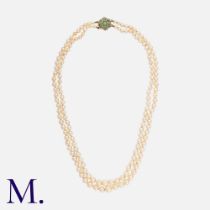 A Pearl Necklace with Demantoid Garnet & Diamond Clasp in yellow gold and silver, comprising two