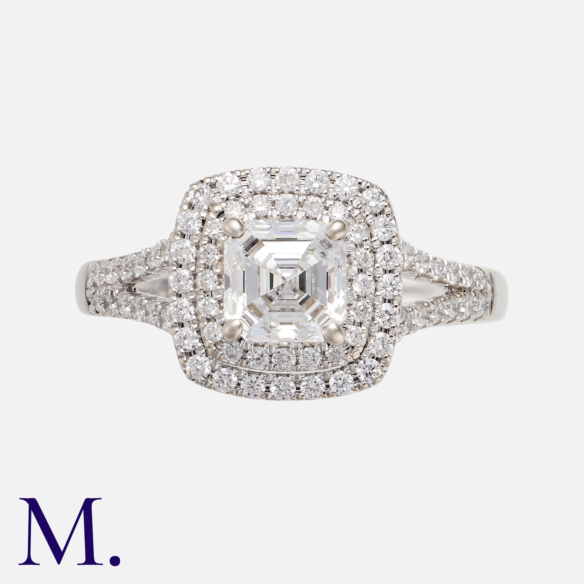 A Diamond Ring in 18k white gold, set with a central Asscher cut diamond of 1.01cts set within a two