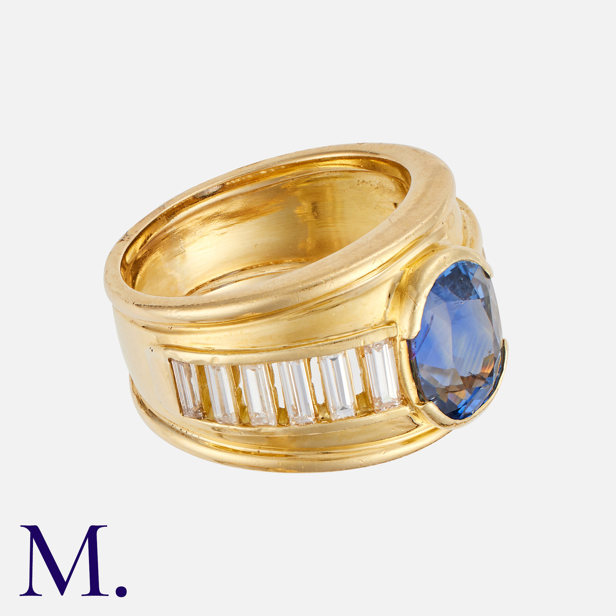 A Sapphire & Diamond Ring in 18K yellow gold, set with an oval-cut sapphire accompanied by a - Image 2 of 2