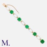 A Crystal and Chrysoprase Bracelet in 18K yellow gold, set with sugarloaf chrysoprase with oval