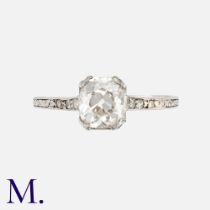 An Old Cut Diamond Ring in platinum and 5% iridium, set with a principal old cut diamond of