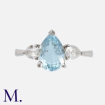 An Aquamarine & Diamond Ring set with a pear cut aquamarine weighing approximately 1.25ct with