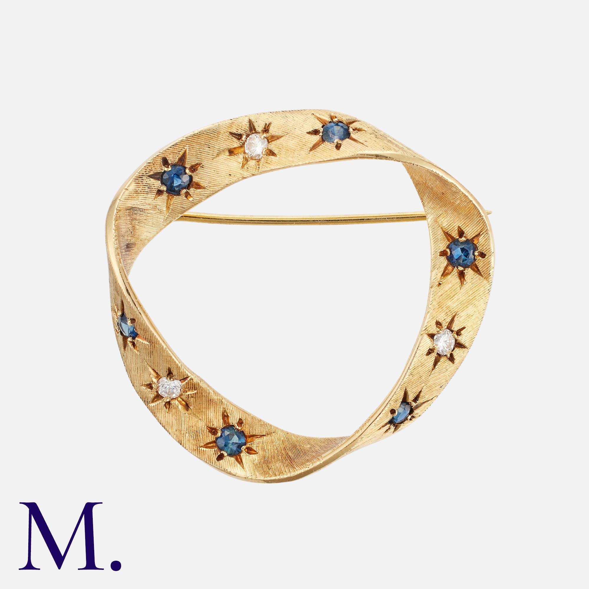 CARTIER. A Sapphire & Diamond Brooch in 18K yellow gold, set with sapphires and diamonds, signed