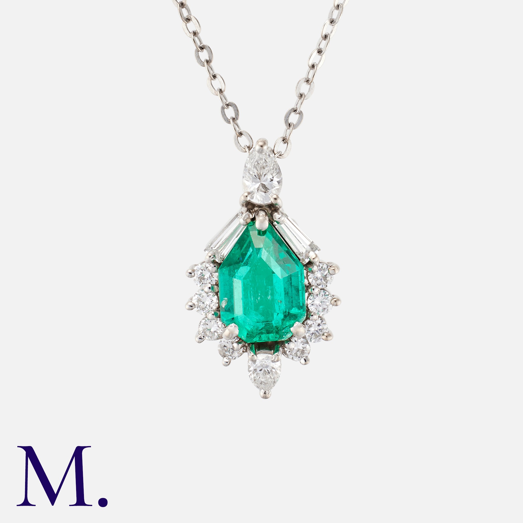 A Colombian Emerald & Diamond Pendant in 18k white gold, set with a principal mixed cut emerald