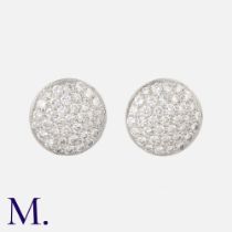 A Pair Of Diamond Stud Earrings in platinum, in circular form, each pave set with round brilliant