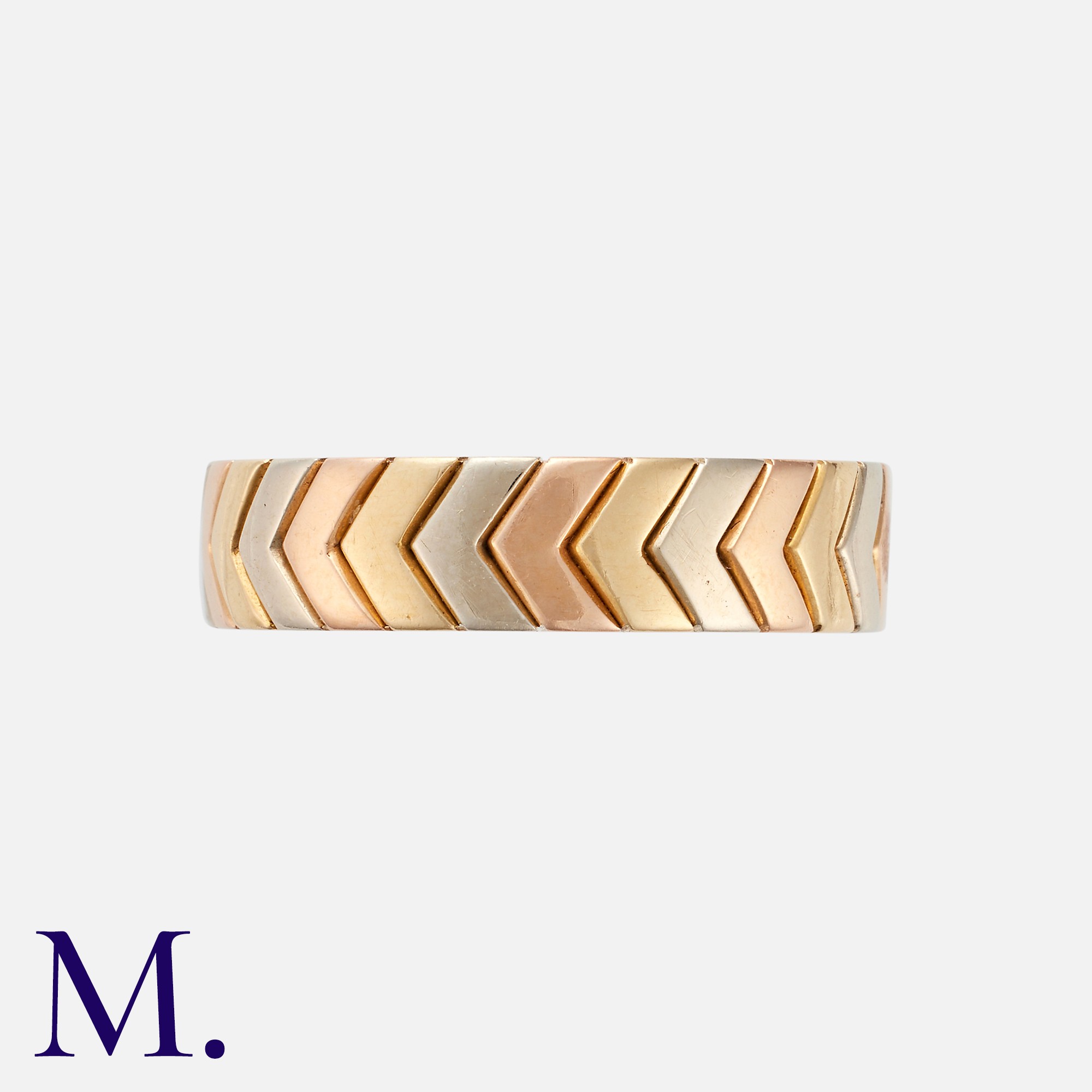 CARTIER. A Chevron Ring in 18K rose, white and yellow gold, in chevron form. Signed Cartier and