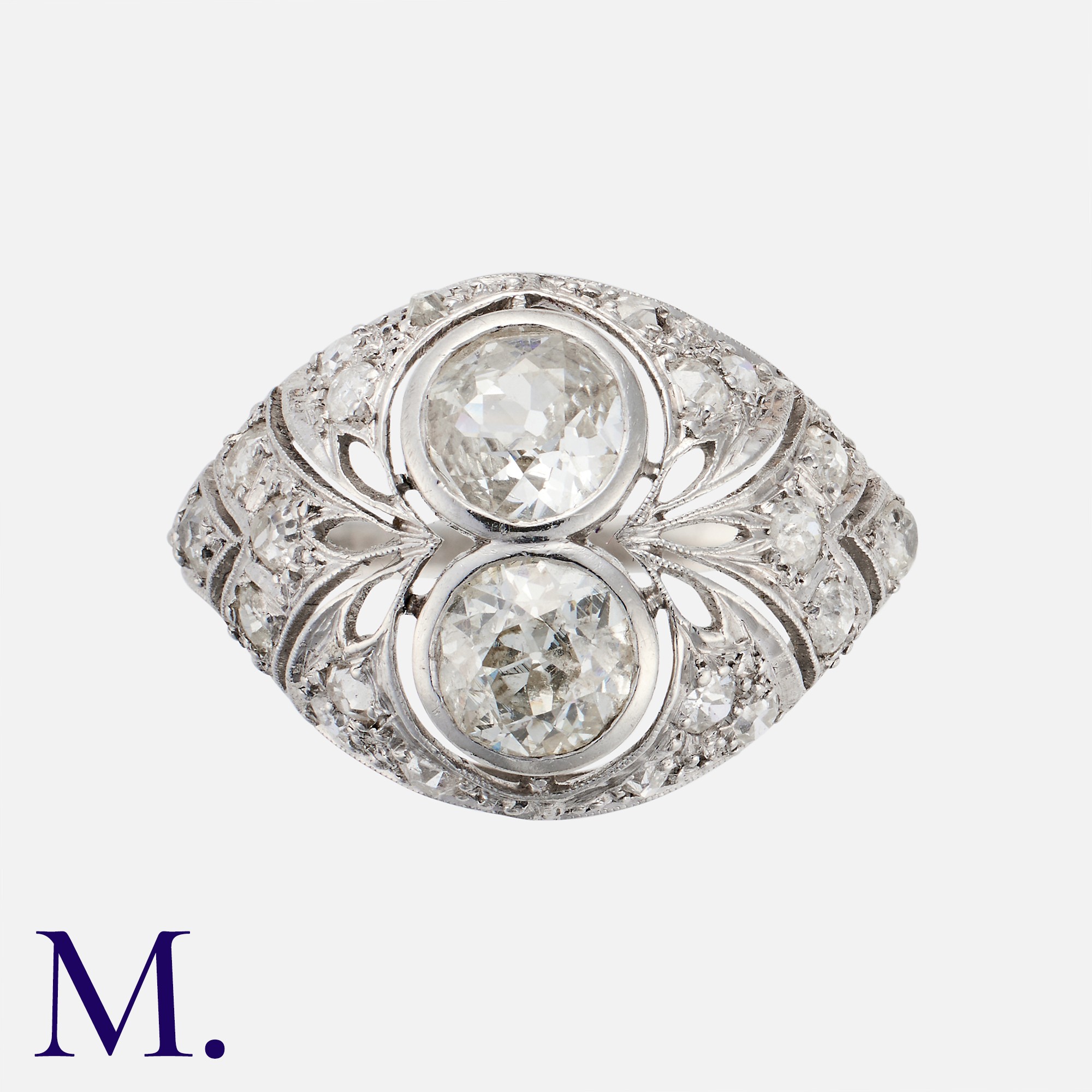 An Art Deco French Diamond Bombe Ring in platinum set with two old cut diamonds of approximately 0.
