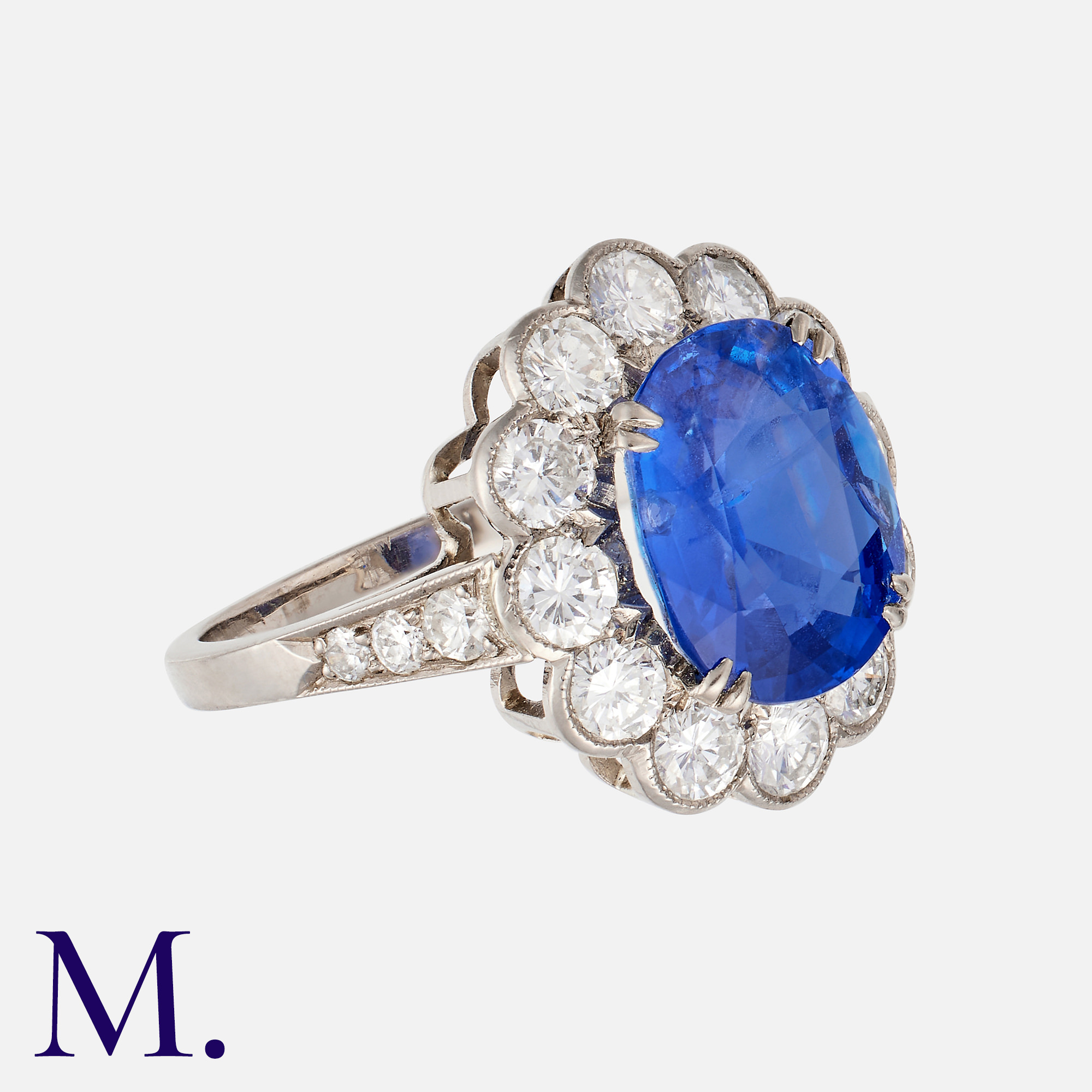 A Burma No Heat Sapphire And Diamond Cluster Ring in platinum, set with a principal blue sapphire of - Image 2 of 2